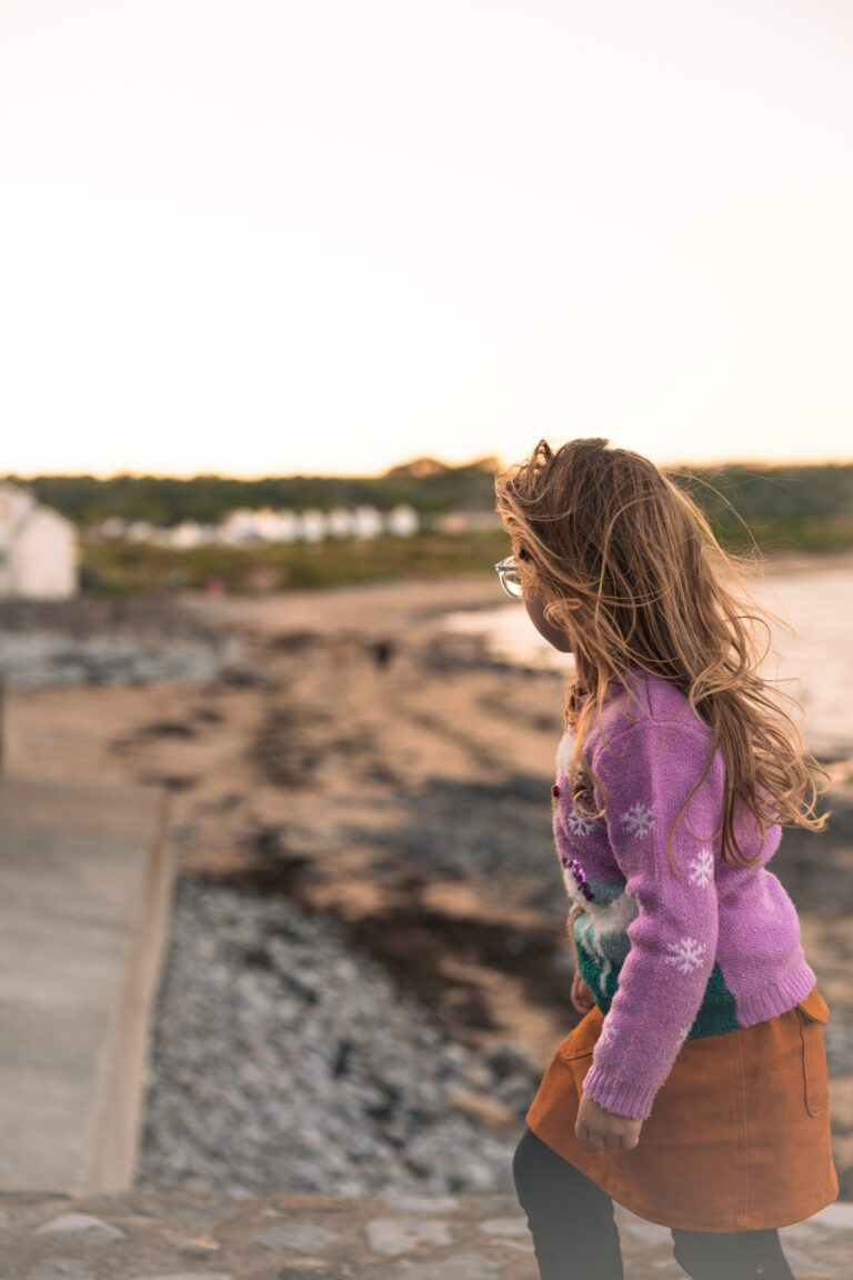 A child enjoying Port Eynon beach